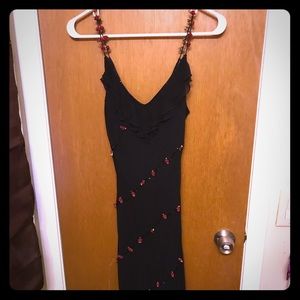 Black and red rose petal ruffle dress